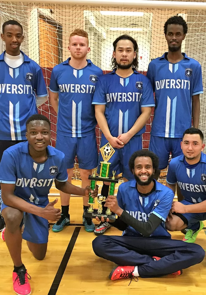 Futsal team with trophy