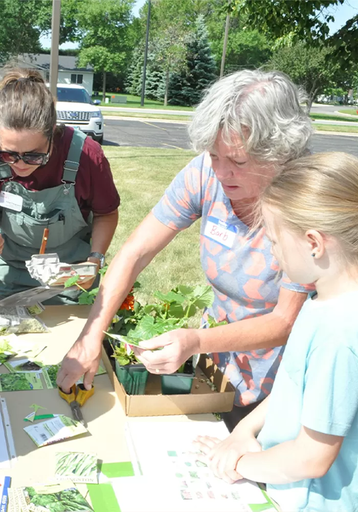 senior and kids gardening