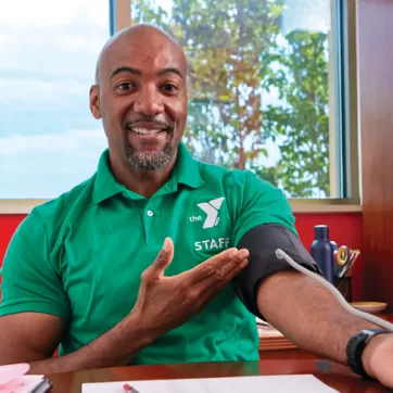 man checking his blood pressure