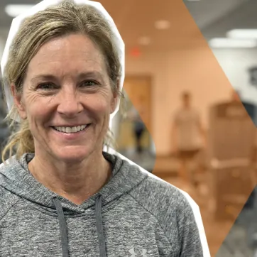 smiling woman in Marshall YMCA fitness center